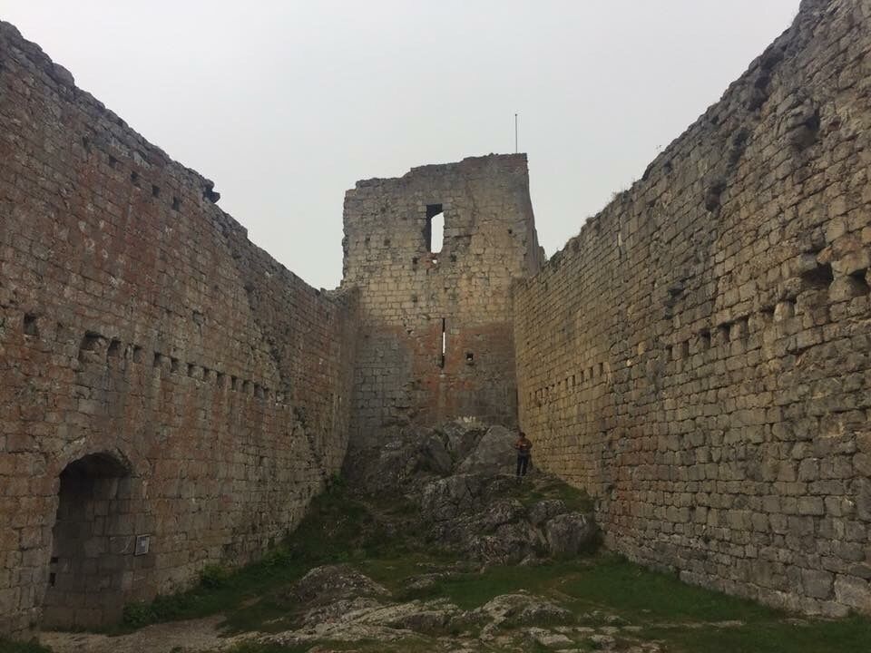 The fog was so dense that we had no idea how far we were climbing, or what the top looked like. Then, a heavy wind blew all the fog away. Standing at the fortress with a clear view of all that lies before, seeing the mighty winds clear the sky and restore visibility was pretty damn awesome. 