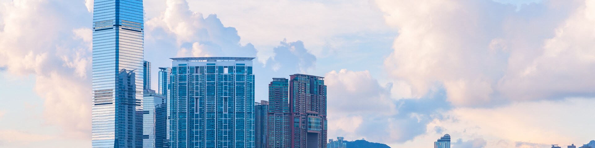 Modern cityscape with skyscrapers. International Commerce Centre of Hong Kong under cloudy evening sky; Shutterstock ID 1064430485; purchase_order: SF 06557000; job: ; client: ; other: