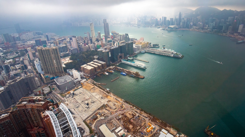 Sky 100 showing mist or fog, a bay or harbor and a city