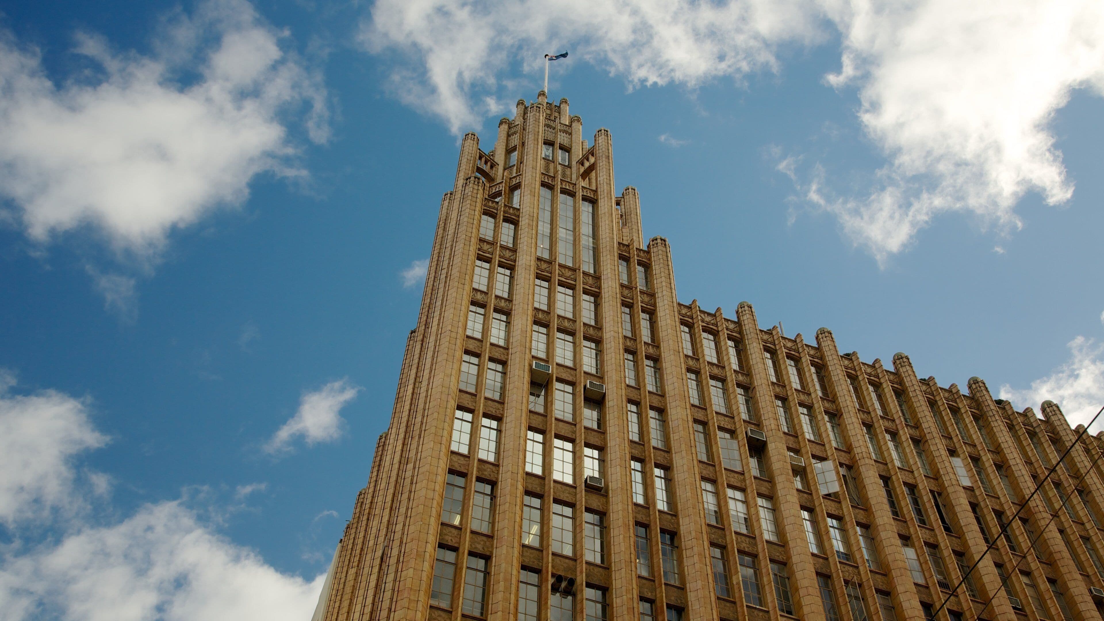 Collins Street which includes a city and a skyscraper