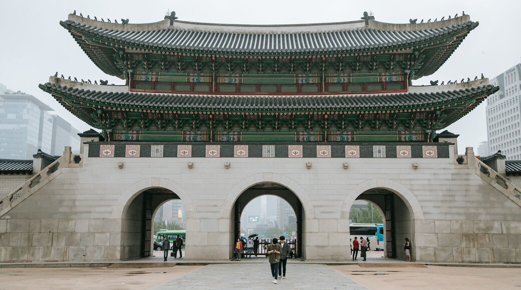 Gwanghwamun which includes a temple or place of worship and heritage architecture