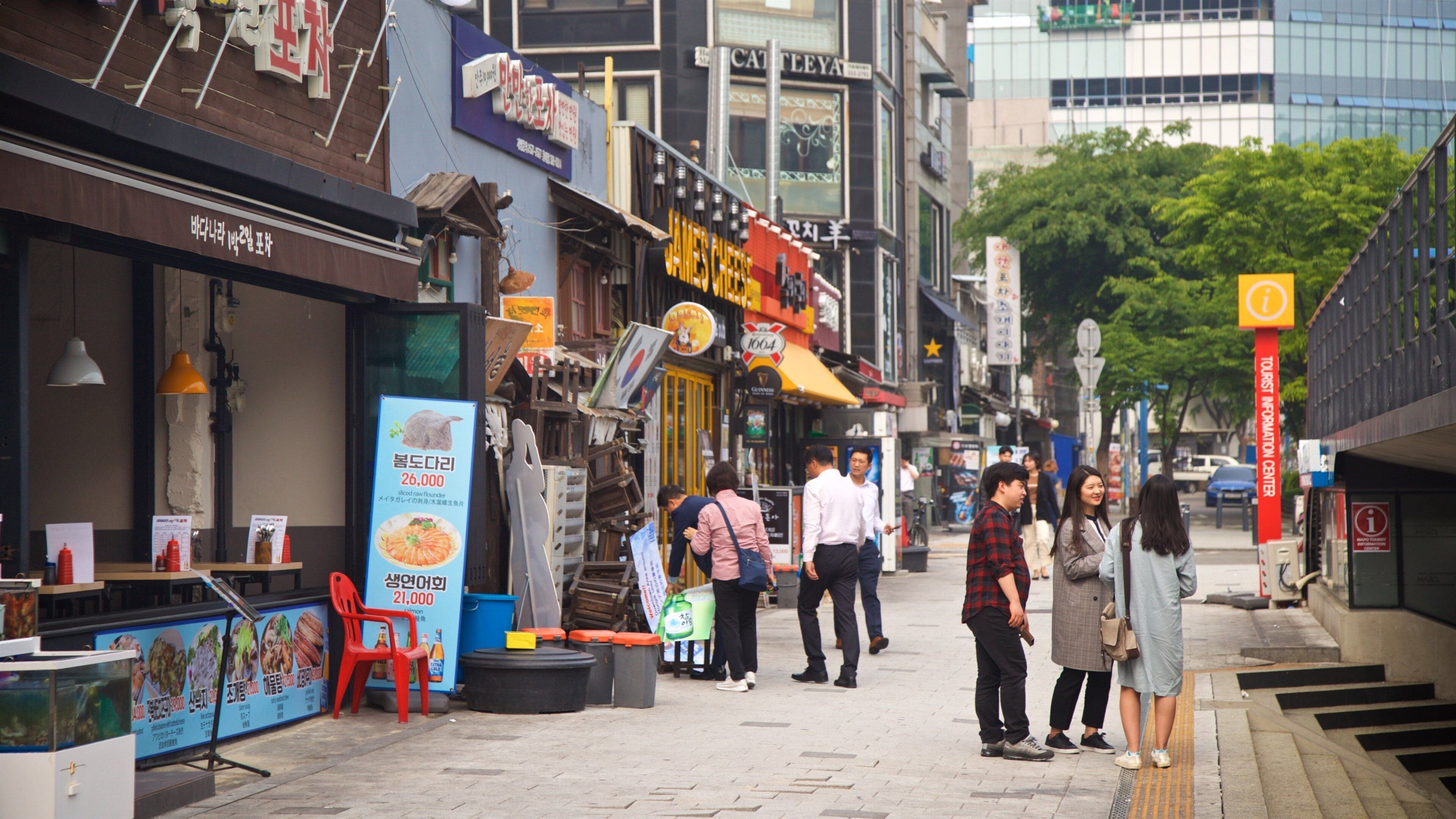 Hongdae which includes street scenes as well as a small group of people