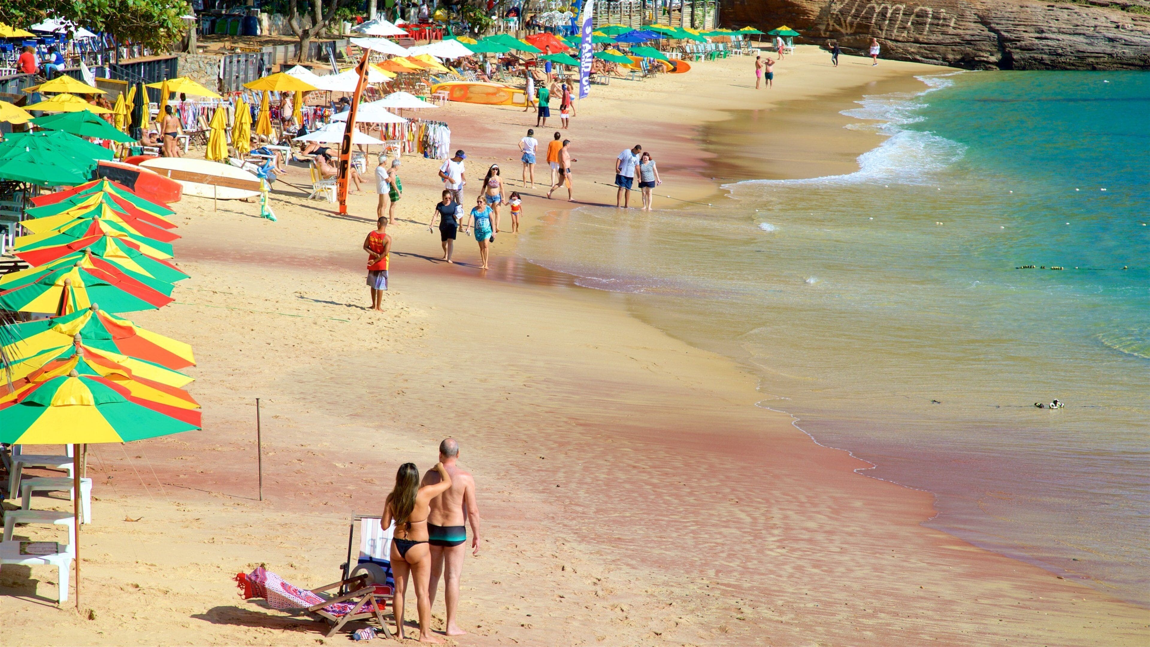 Joao Fernandes Beach which includes a sandy beach and general coastal views as well as a couple