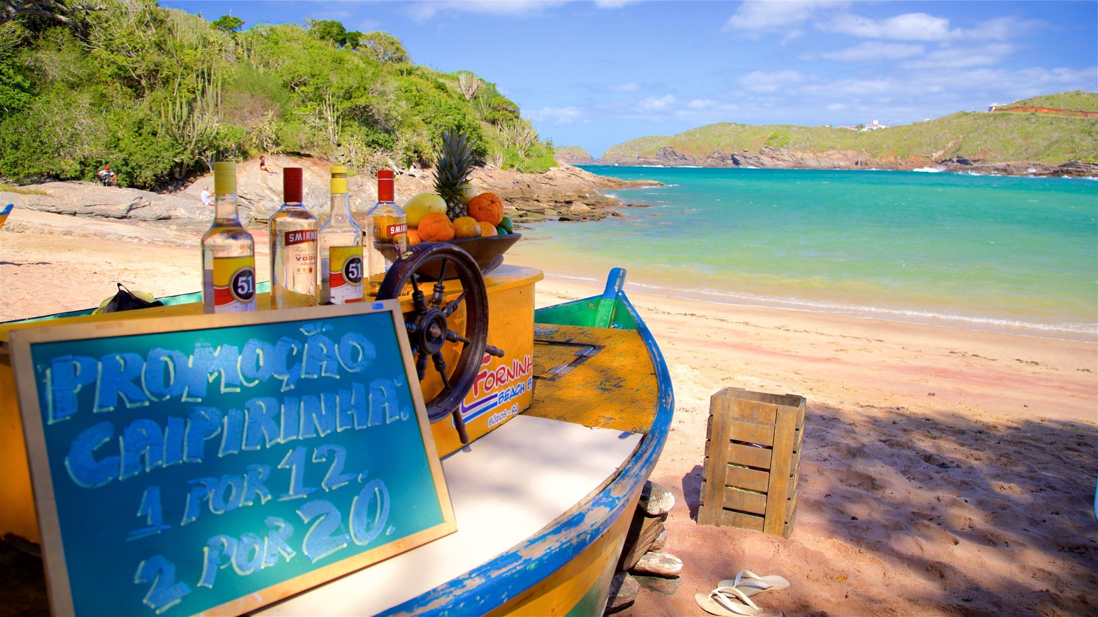 Forno Beach showing general coastal views, a beach and signage