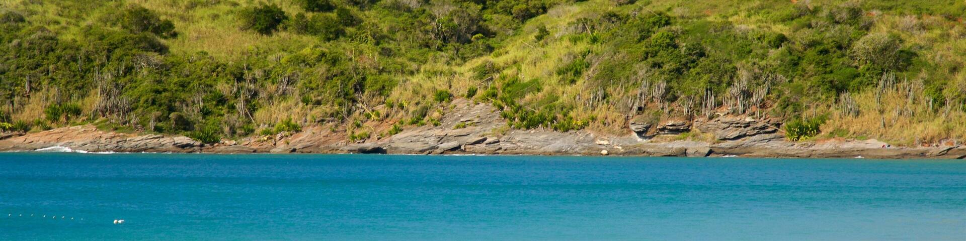 Brava Beach which includes kayaking or canoeing and general coastal views as well as an individual male