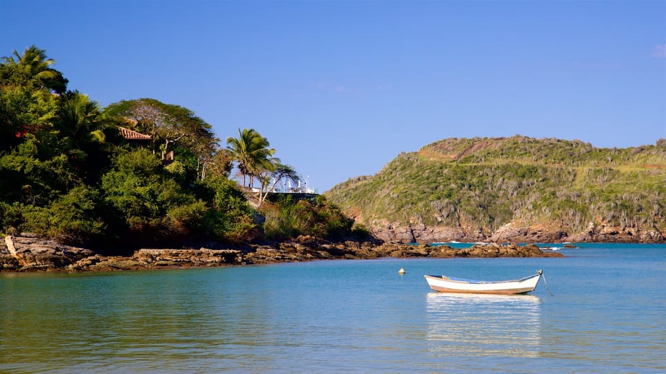 Ferradura Beach which includes rugged coastline and general coastal views