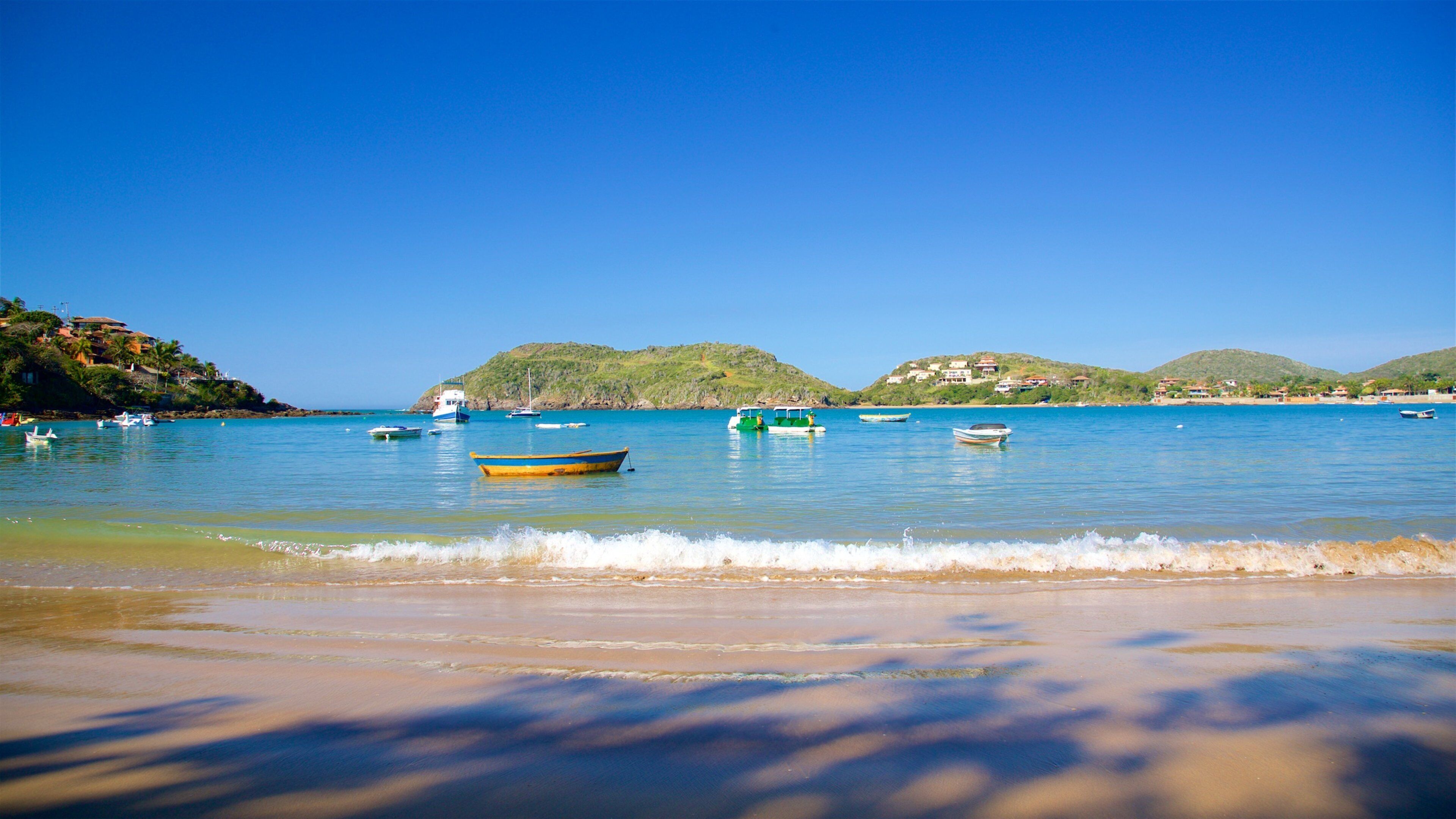 Ferradura Beach showing a sandy beach and general coastal views