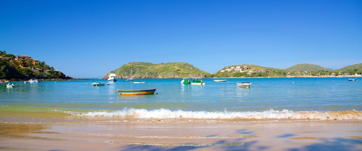 Ferradura Beach which includes general coastal views and a beach