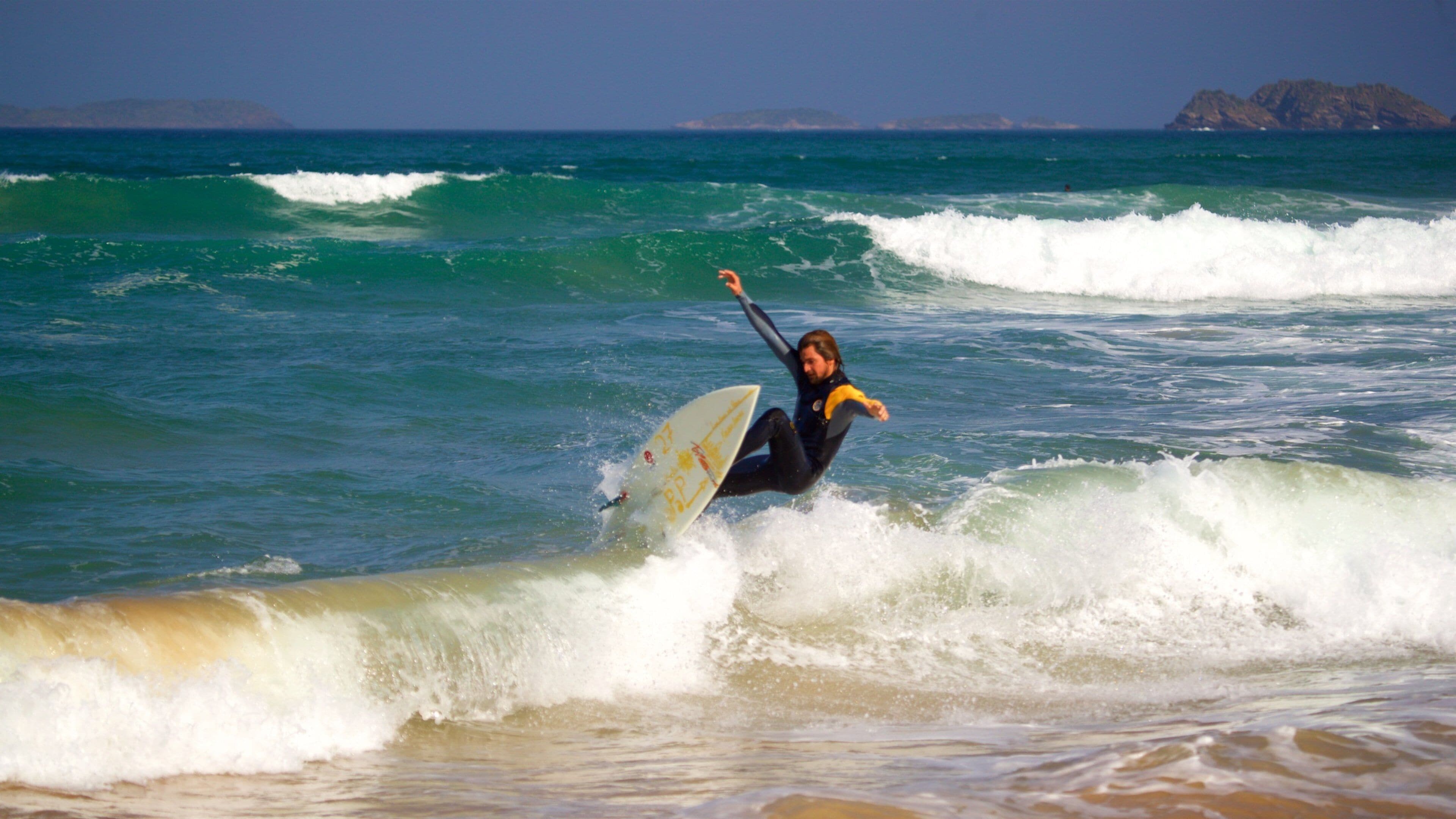 Geriba Beach showing surfing, general coastal views and surf