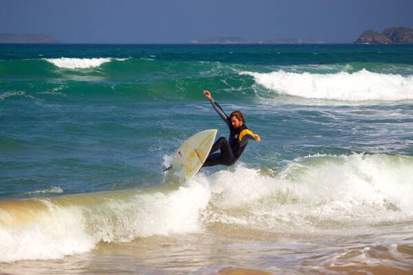 Geriba Beach showing surfing, general coastal views and surf