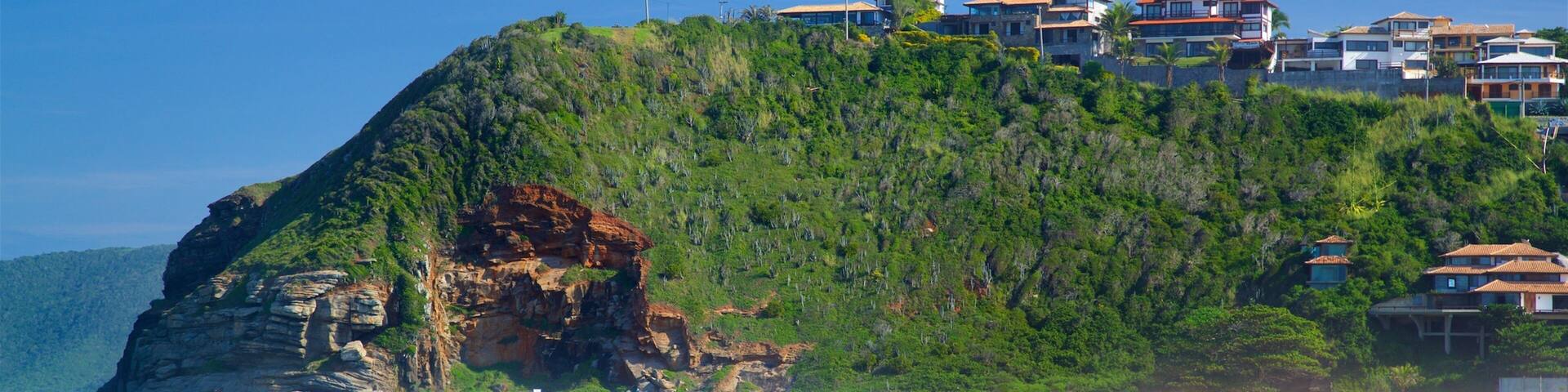 Geriba Beach which includes a sandy beach, a coastal town and general coastal views