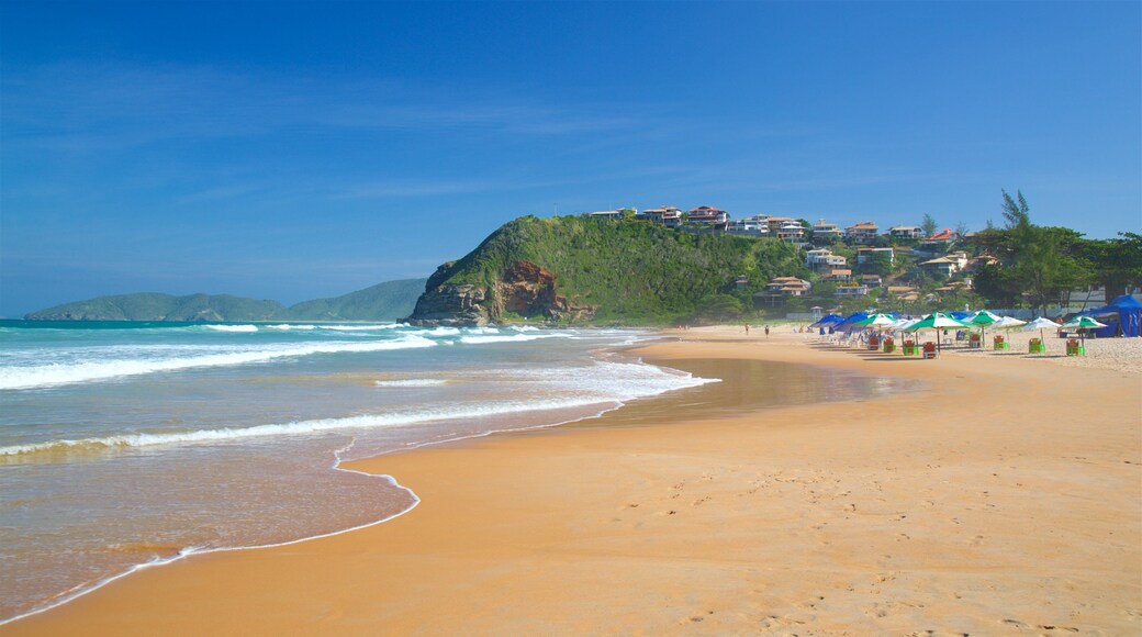 Geriba Beach showing a sandy beach, general coastal views and a coastal town