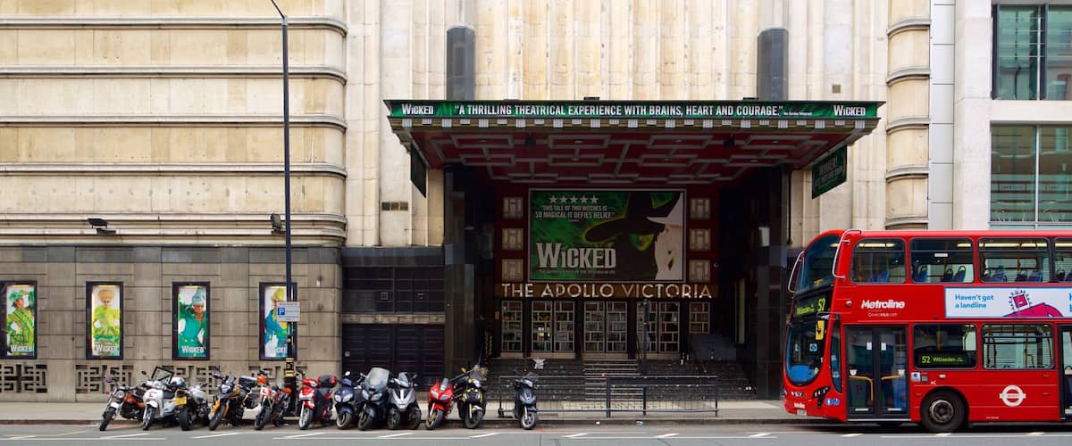 Apollo Victoria Theatre showing signage, theatre scenes and heritage architecture