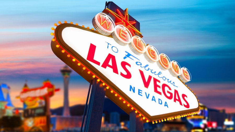 Welcome To Fabulous Las Vegas Sign With Beautiful City Lights at Sunset