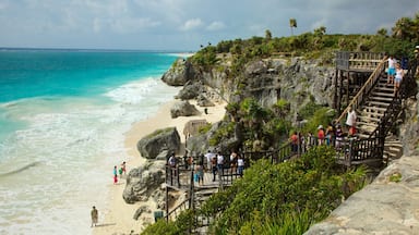 Tulum Mayan Ruins featuring tropical scenes and rocky coastline