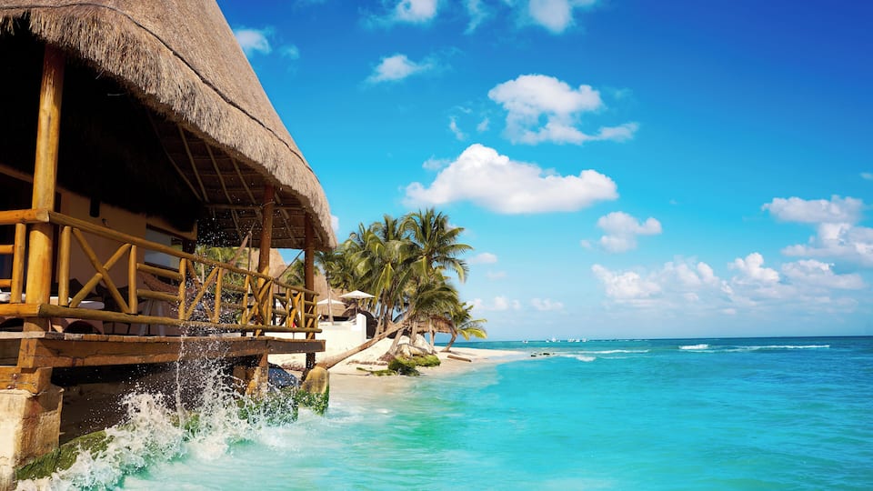Playa del Carmen beach palapa in Riviera Maya Caribbean at Mayan Mexico