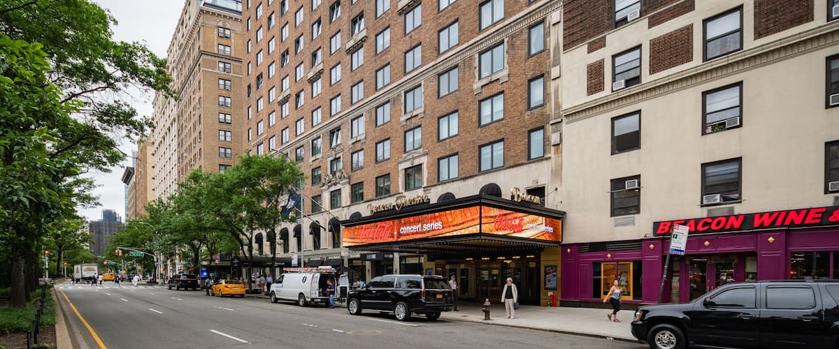 Beacon Theater which includes street scenes and a city
