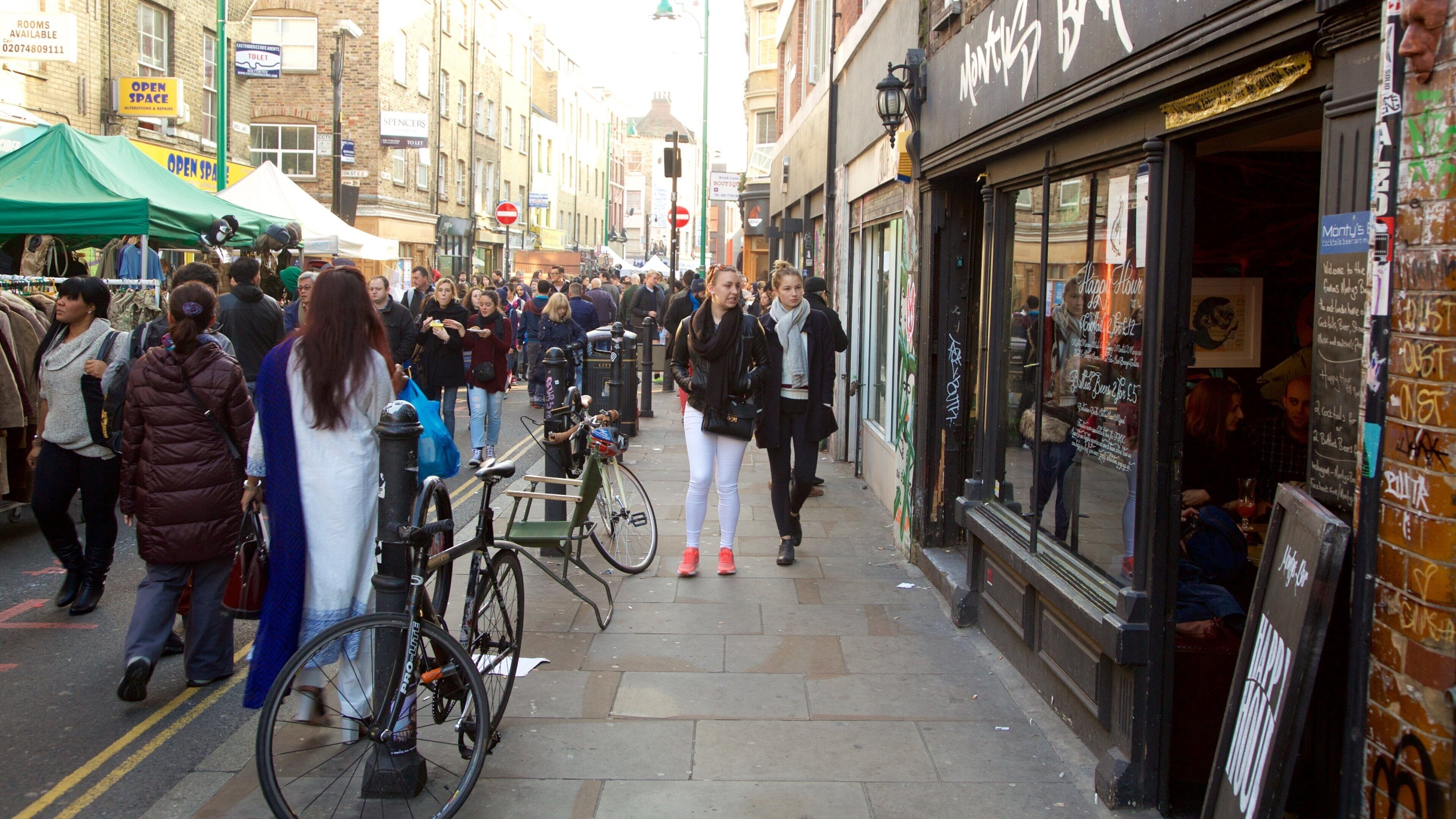 Brick Lane featuring a city, markets and street scenes