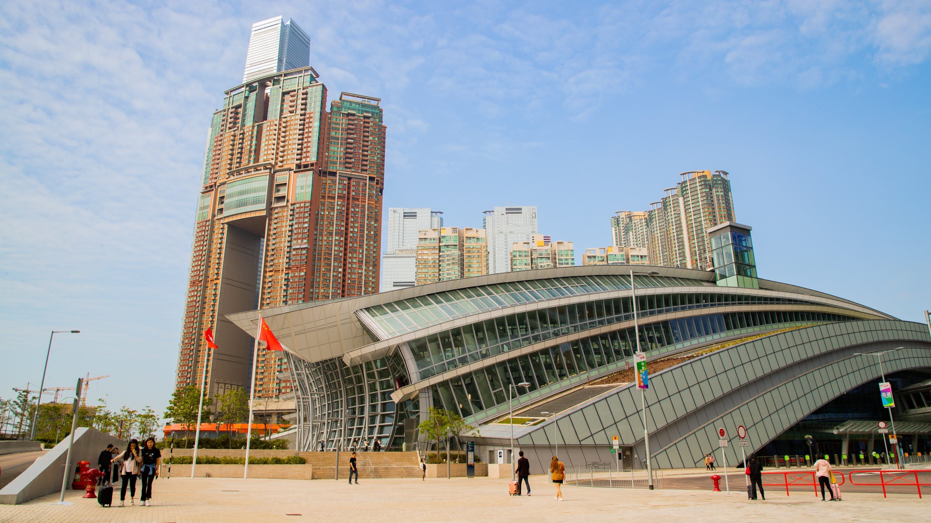 West Kowloon showing modern architecture, a high rise building and a square or plaza