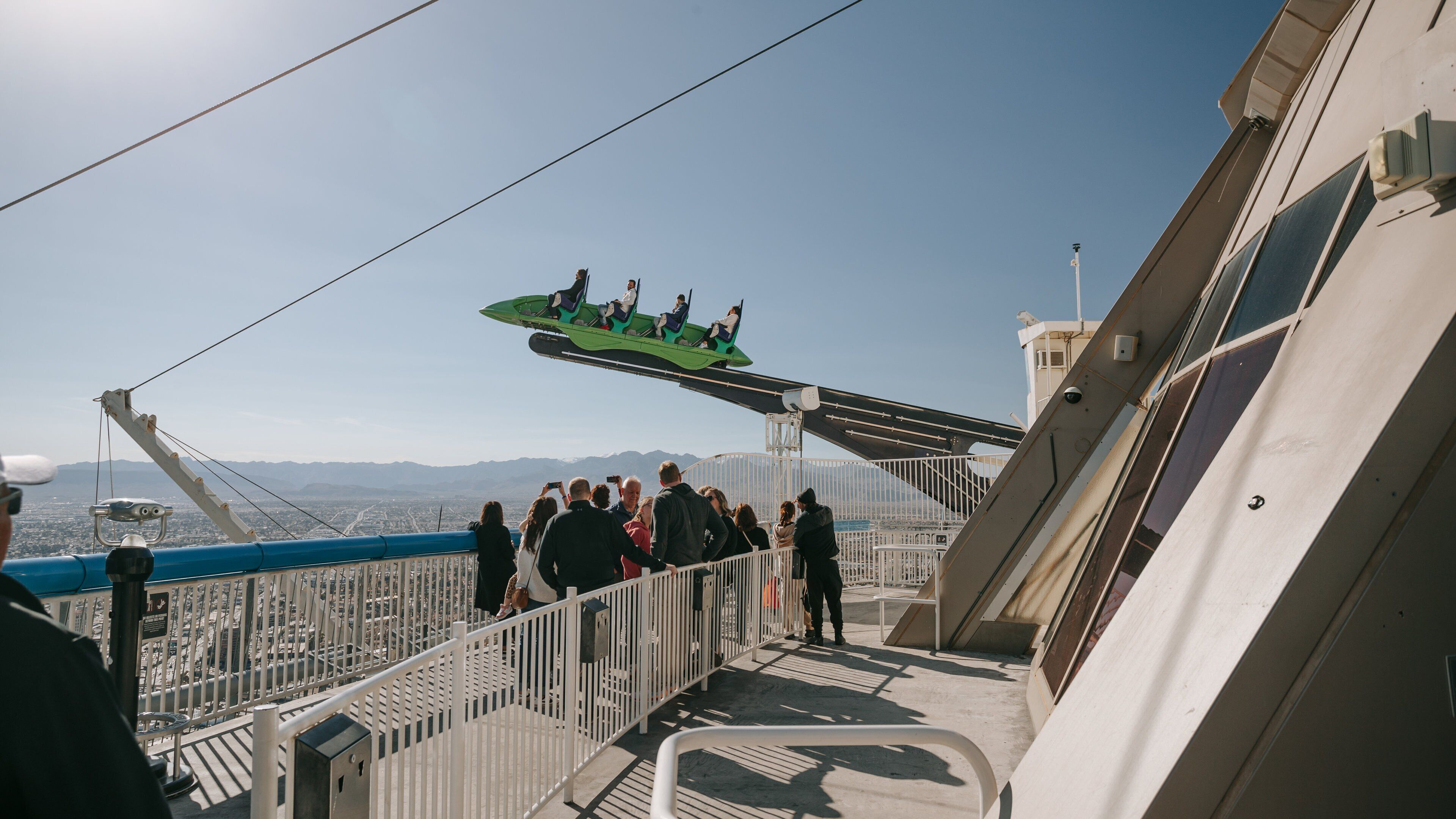 Stratosphere Tower which includes rides and views as well as a small group of people