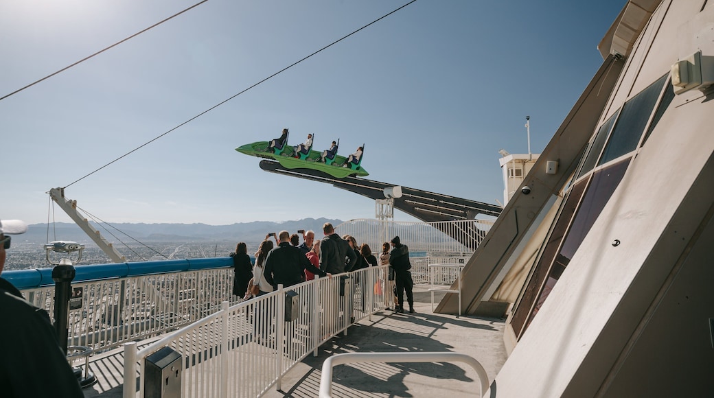 Stratosphere Tower which includes rides and views as well as a small group of people