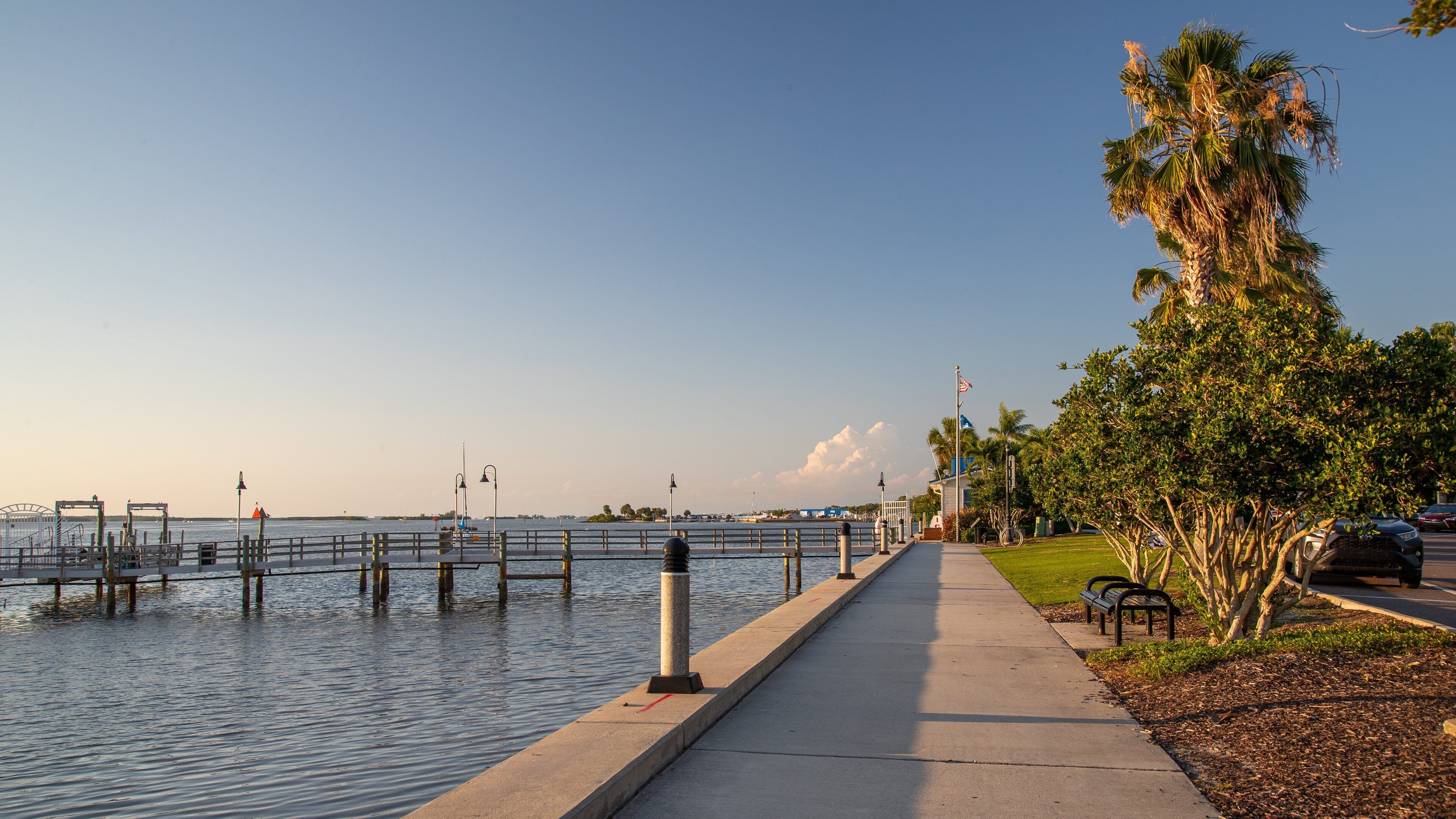 Coachman Park which includes a sunset, a garden and general coastal views