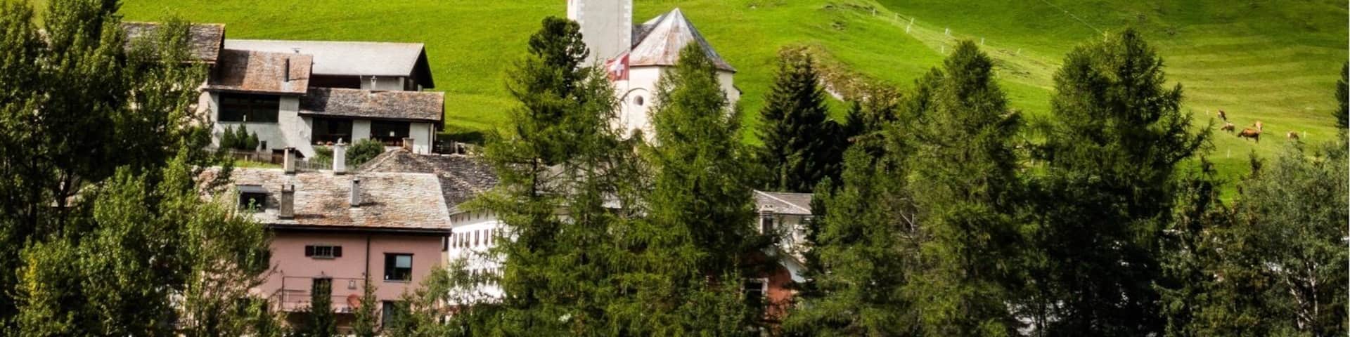 The 9,752' (2,973m) Teurihorn looms over the village of Splügen. With well-marked trails throughout the country and backcountry huts, Switzerland is a great hiking destination. #mysummervacation #lifeatexpedia #hiking #mountains #Switzerland