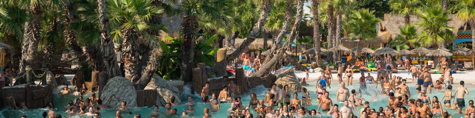 Aqualandia showing a waterpark, a pool and swimming