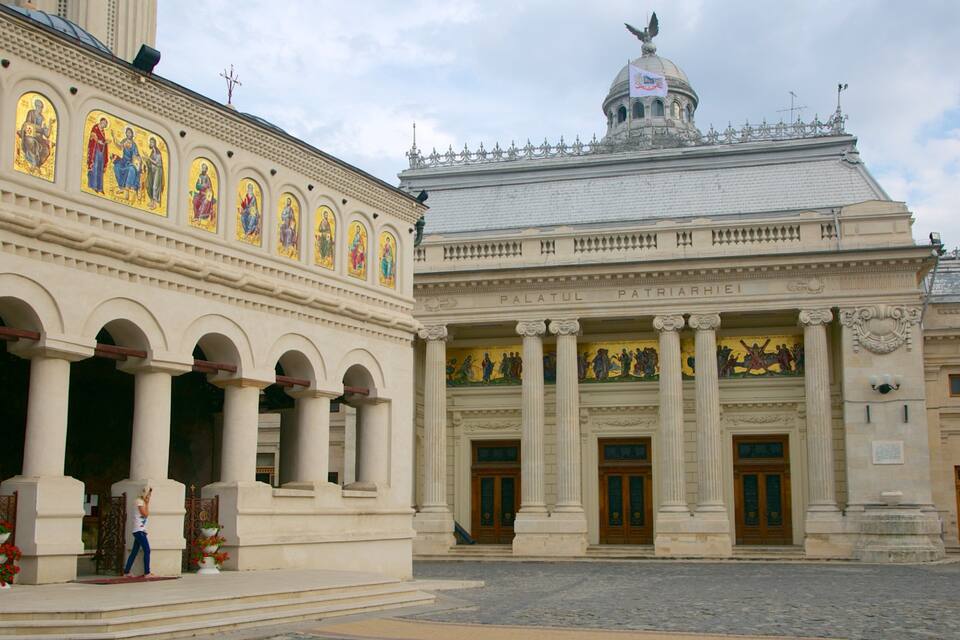 A historic building with ornate columns and a dome.