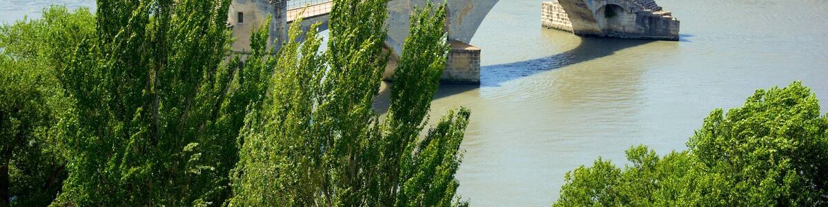 Parc des Expositions which includes a bridge, heritage architecture and a river or creek