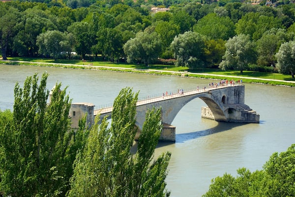 Parc des Expositions which includes a bridge, heritage architecture and a river or creek