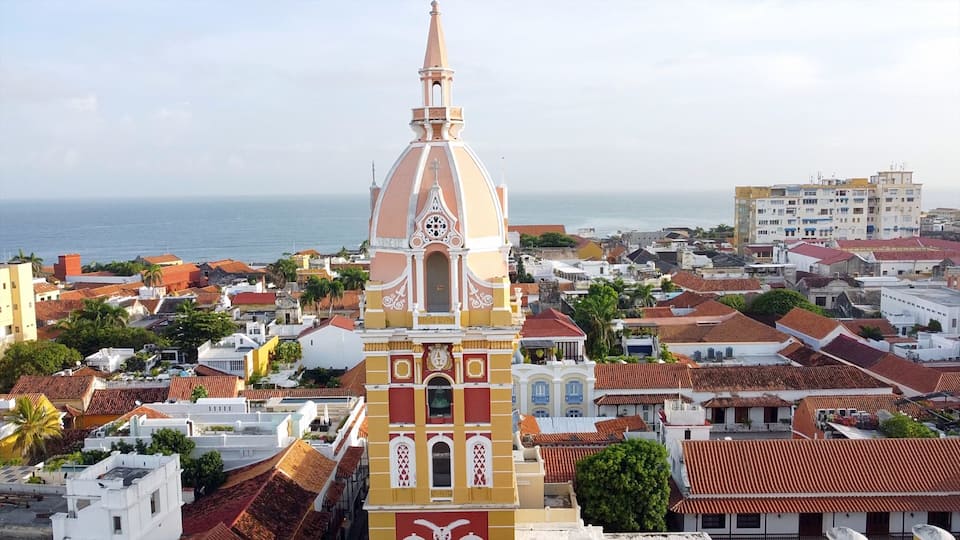 Colombia , Cartagena de Indias is a Unesco Heritage World - Drone aerial view of Downtown of historic colonial Spanish city with colored houses and church in Getsemani district