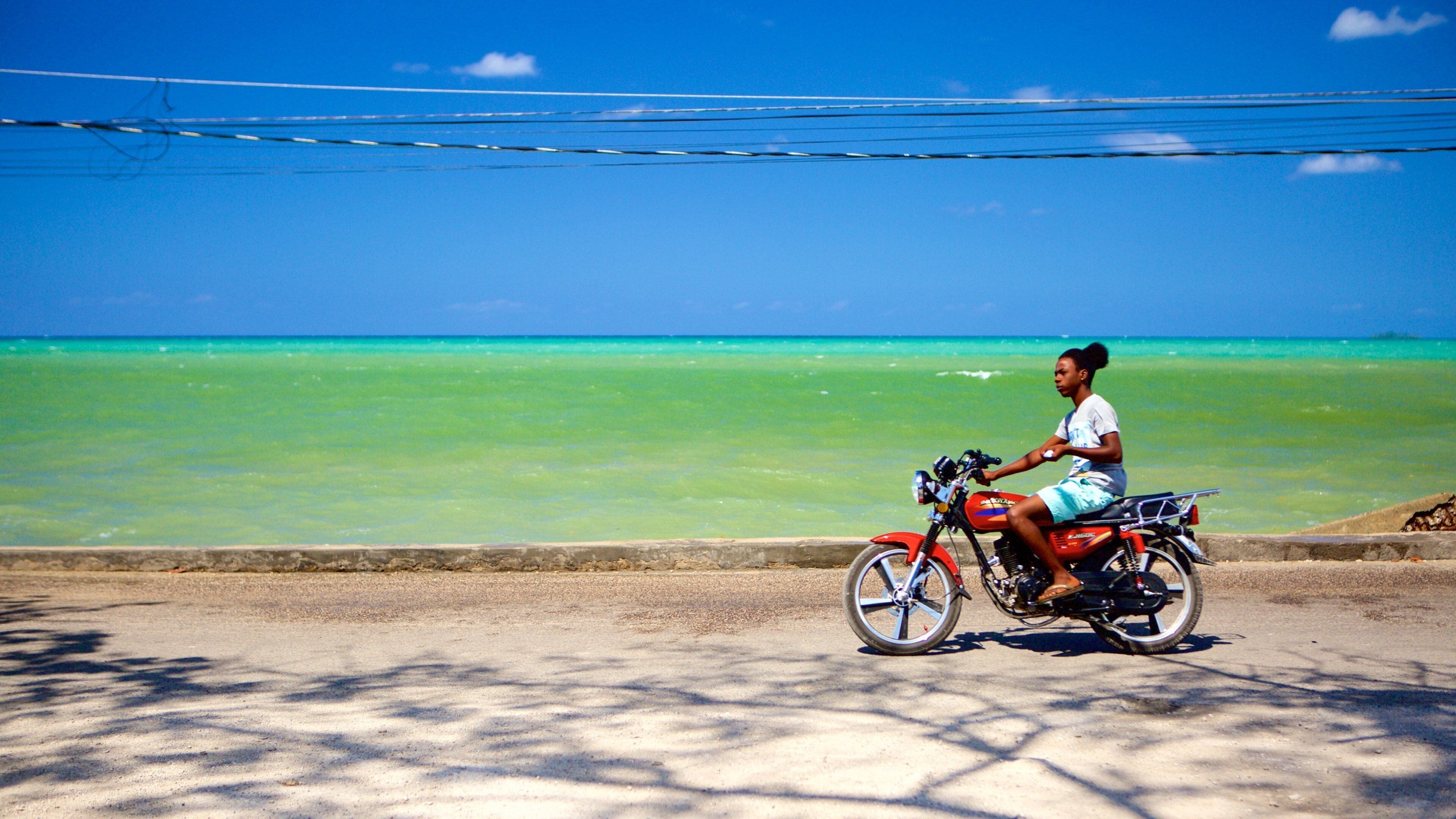 West End which includes general coastal views and motorcycle riding as well as an individual male