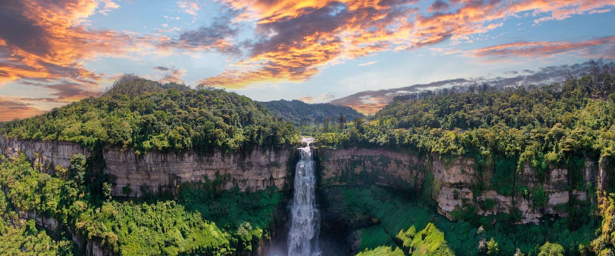 Aerial panoramic view of the El Salto de Tequendama, one of the most imposing waterfalls in Colombia amazing sunset