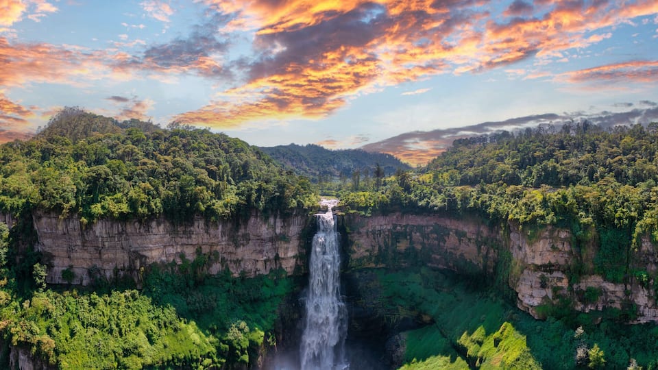 Aerial panoramic view of the El Salto de Tequendama, one of the most imposing waterfalls in Colombia amazing sunset