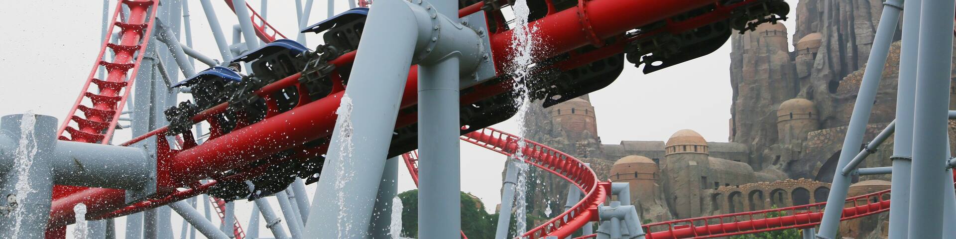 Visitors Happy Valley amusement park ride a rollercoaster, Beijing