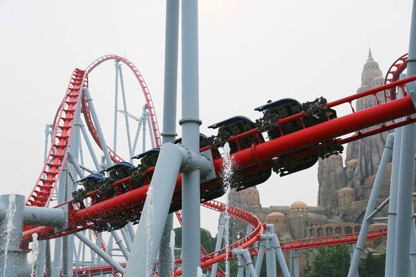 Visitors Happy Valley amusement park ride a rollercoaster, Beijing