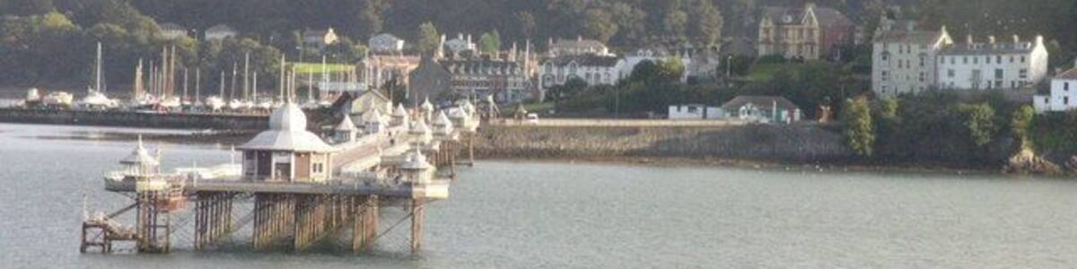 Bangor Pier with the Glyders and Nant Ffrancon Pass in distance Viewed from A545 (Beaumaris to Menai Bridge)