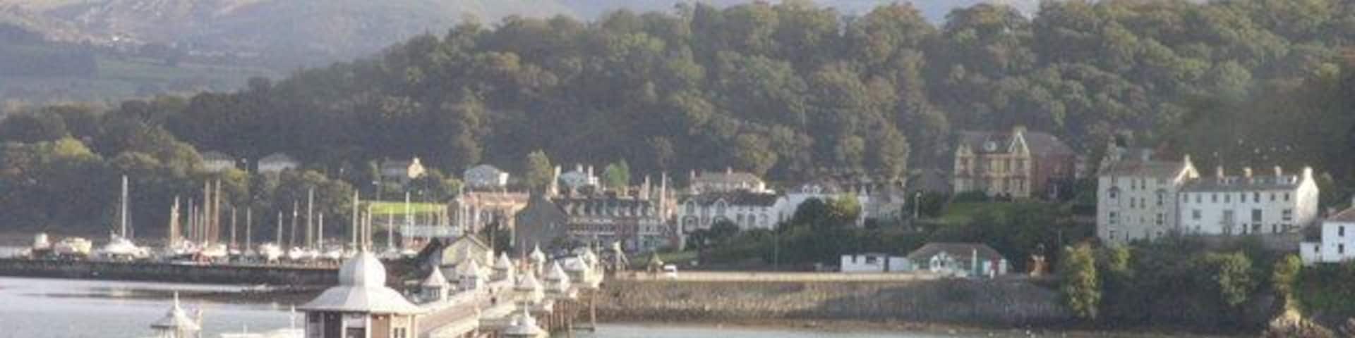 Bangor Pier with the Glyders and Nant Ffrancon Pass in distance Viewed from A545 (Beaumaris to Menai Bridge)