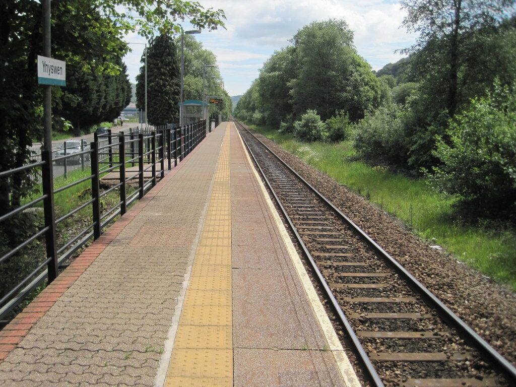 Ynyswen railway station, Rhondda Cynon Taf. Opened in 1986 by British Rail on the line from Cardiff to Treherbert. View south east towards Treorchy and Cardiff.