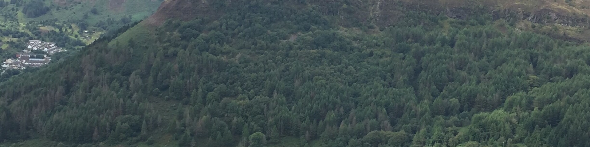 A view of a table top mountain, Pen Pych is a part of the Rhigos mountain and situated in the Rhondda valley, South Wales.