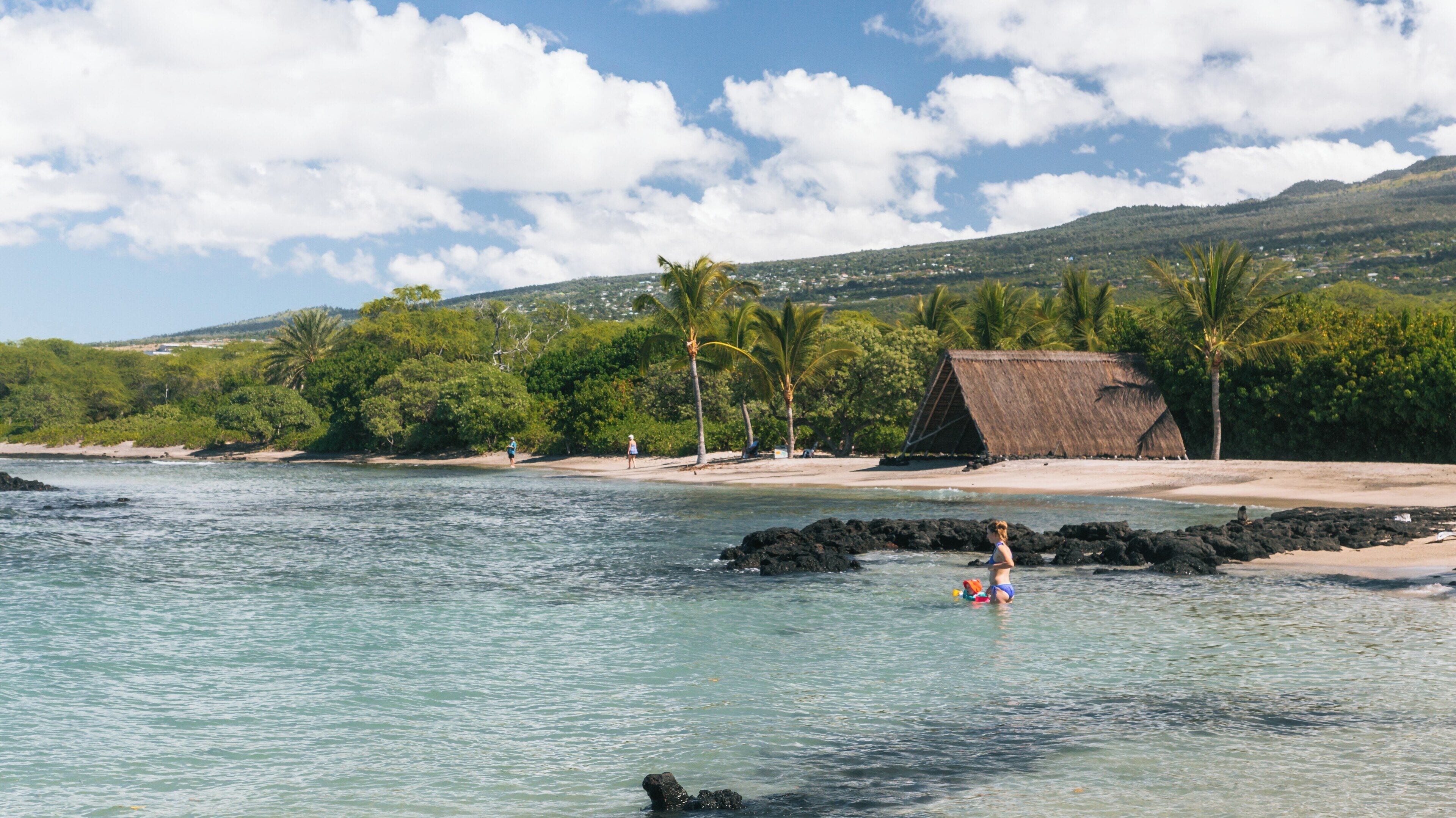 Exploring the serene beauty of Kaloko-Honokohau National Historical Park in Kailua-Kona, Hawaii on a sunny day