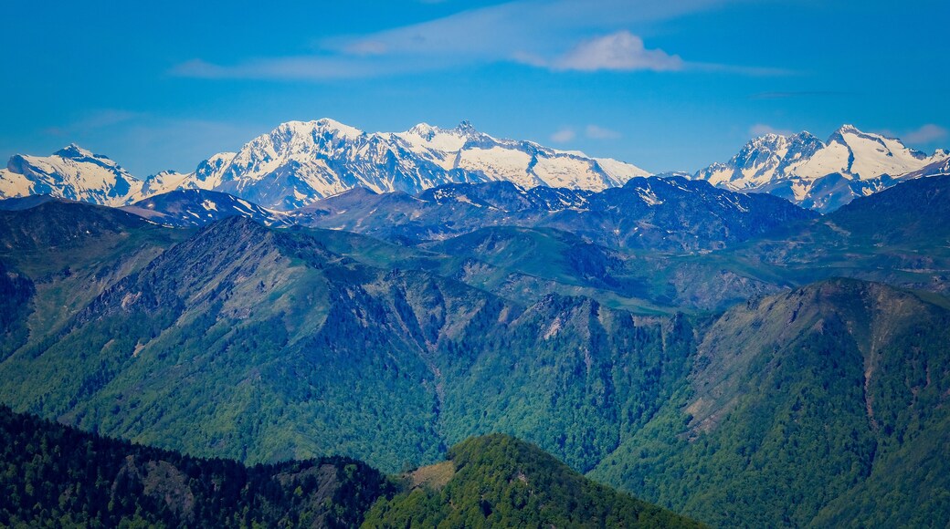 View on the snow covered Pyrenees mountains range from the summit of Tuc de l'étang in the south of France near Mourtis ski resort