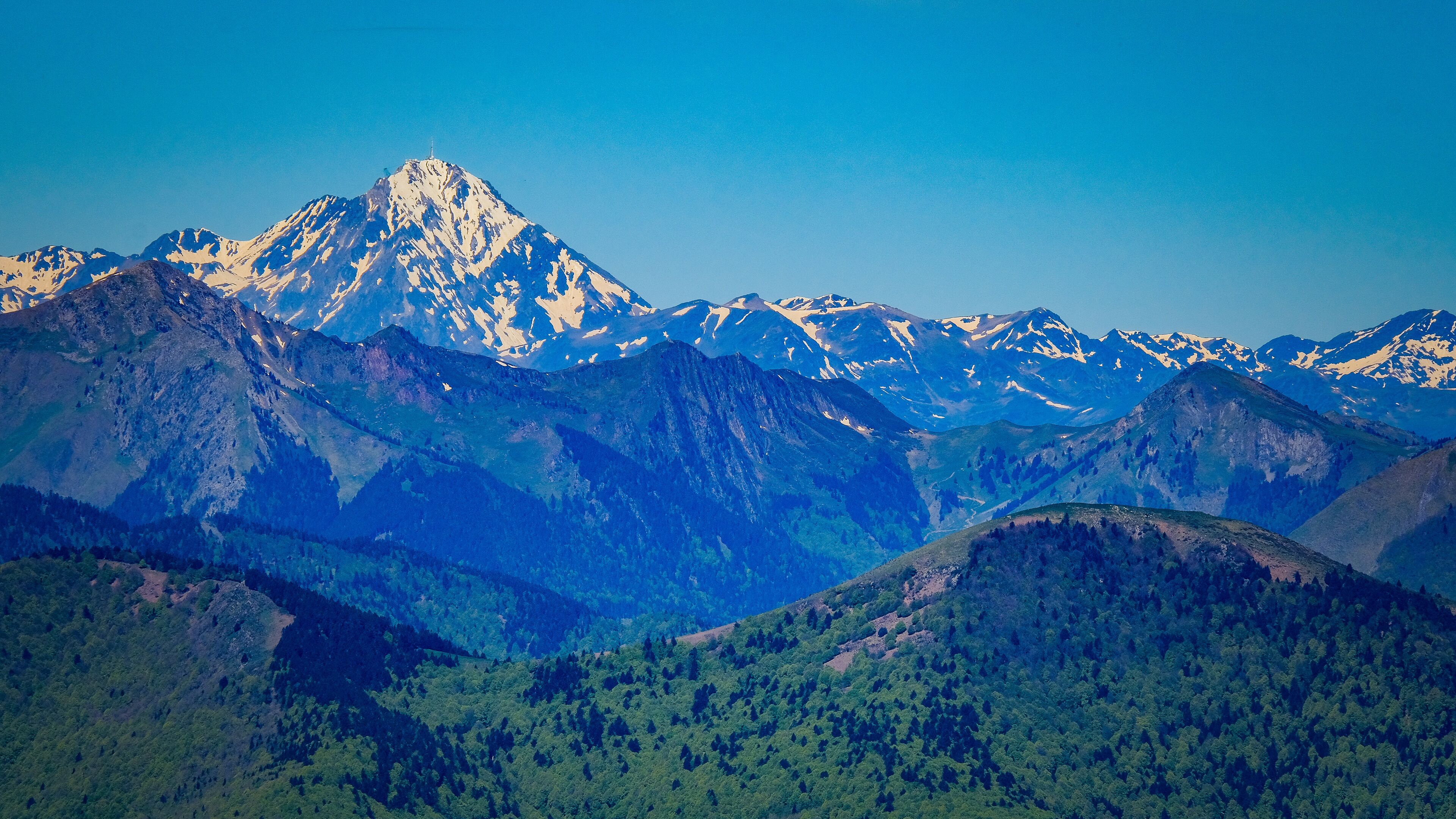 View from the summit of the Tuc de l'étang on the Pic du Midi de Bigorre in the Pyrenees mountain range in the South of France