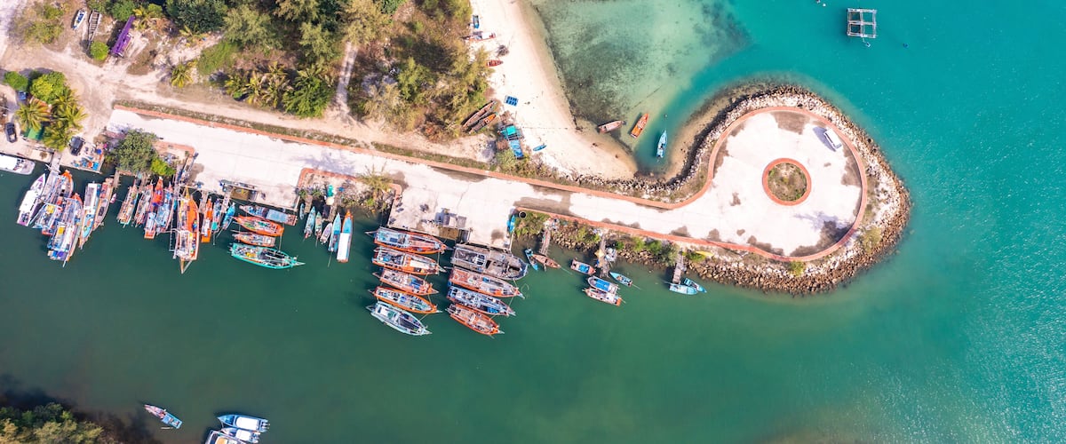 Aerial view of Thong Sala pier, boat and koh Tae Nai in koh Phangan, Thailand
