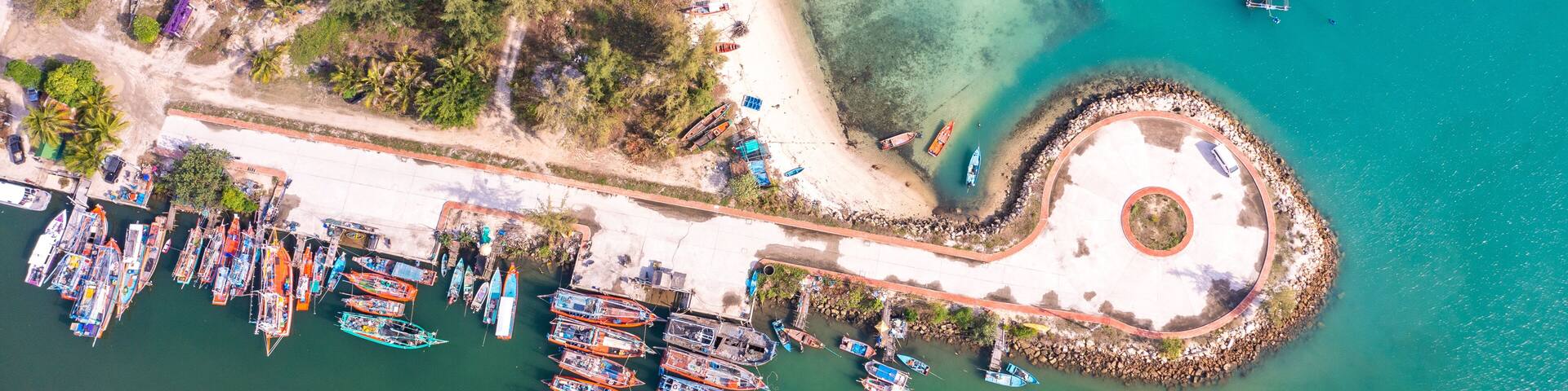 Aerial view of Thong Sala pier, boat and koh Tae Nai in koh Phangan, Thailand