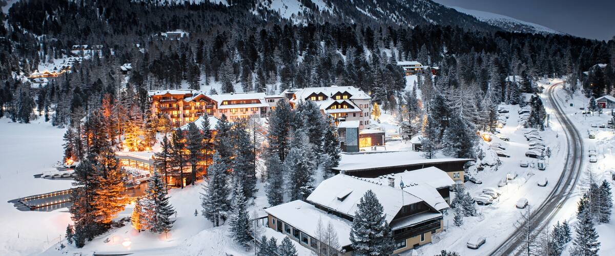 View on the mountains with hotels in Turracher Höhe, Austria in winter