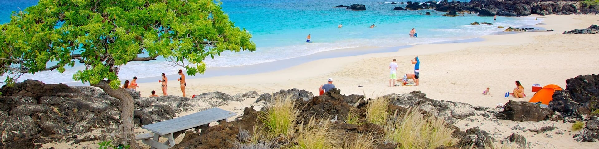 Kua Bay showing a sandy beach and a coastal town