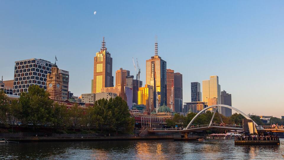 Yarra Riverfront featuring a sunset, a city and a bay or harbor