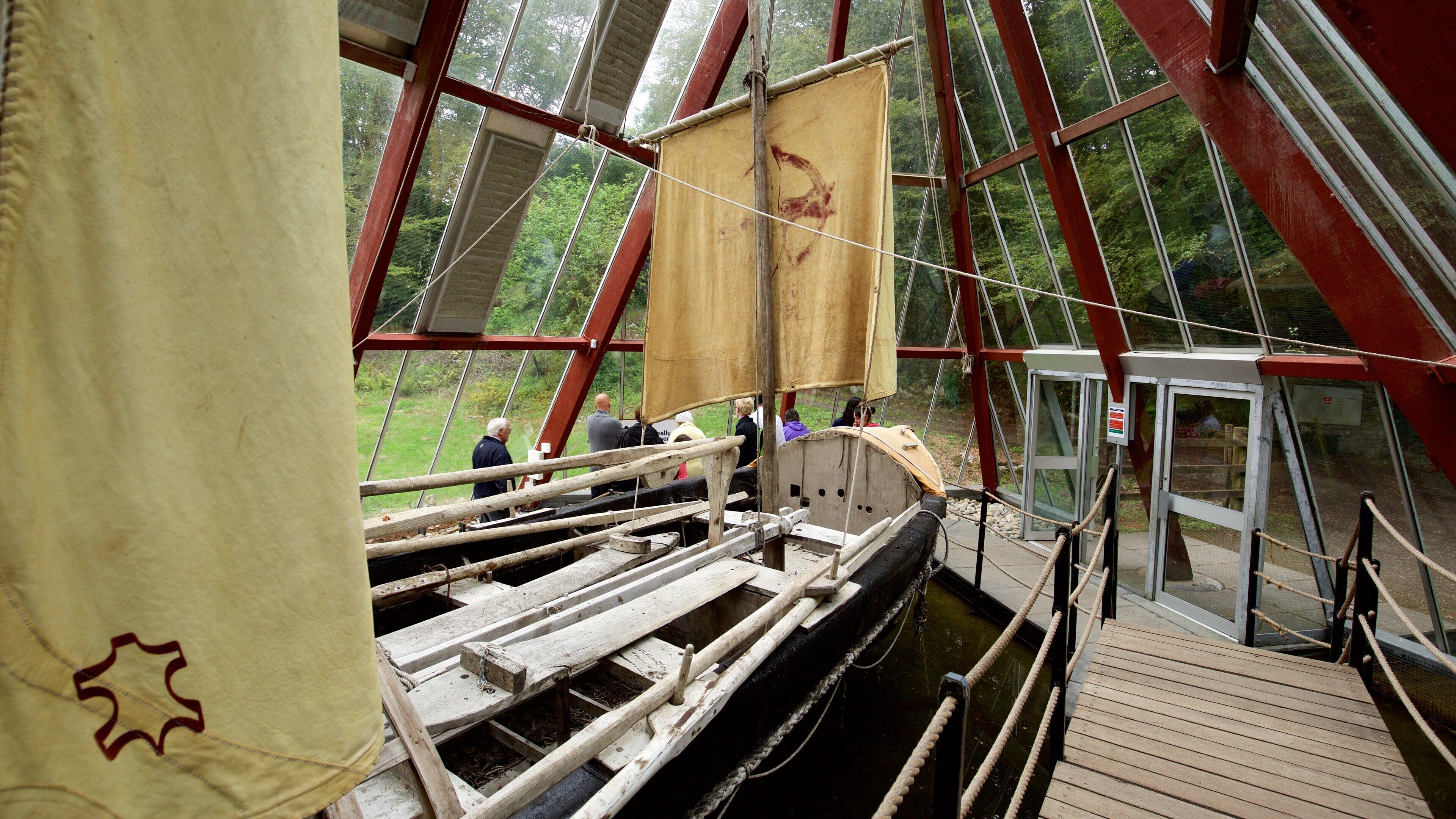 Craggaunowen which includes interior views and modern architecture as well as a small group of people